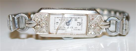 Ladys platinum and diamond set cocktail watch on steel bracelet